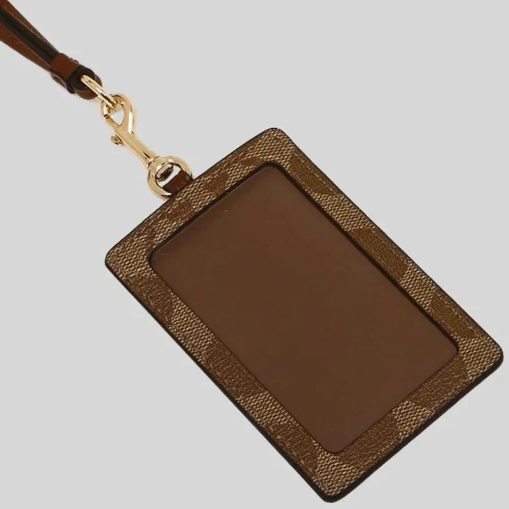 COACH ID Lanyard In Signature Canvas Tan Saddle